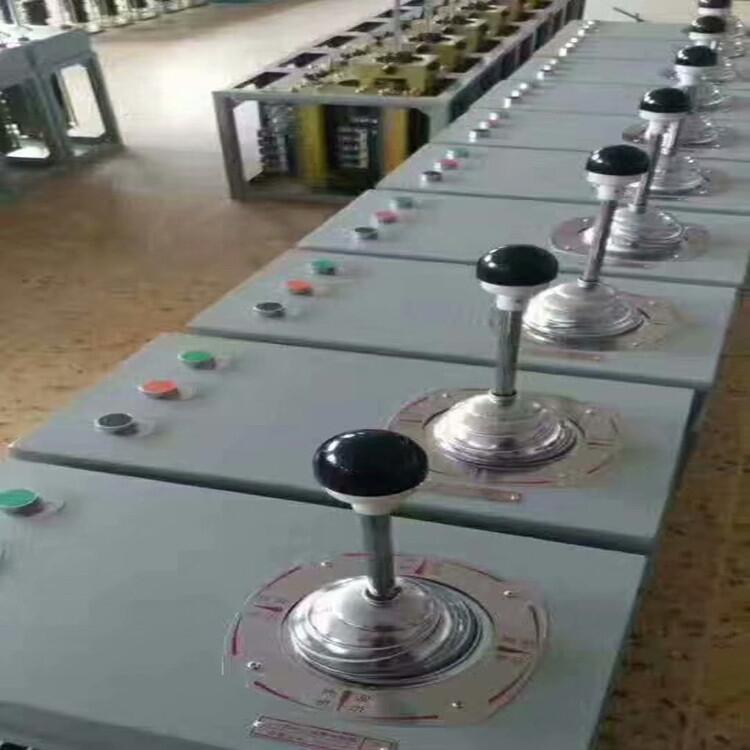 QT5-111/58聯(lián)動(dòng)控制臺(tái)可根據(jù)使用單位的要求來決定手柄位置和相應(yīng)機(jī)構(gòu)的觸頭分合程序